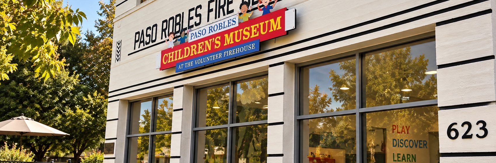 The Paso Robles Children's Museum sign on the former volunteer firehouse building