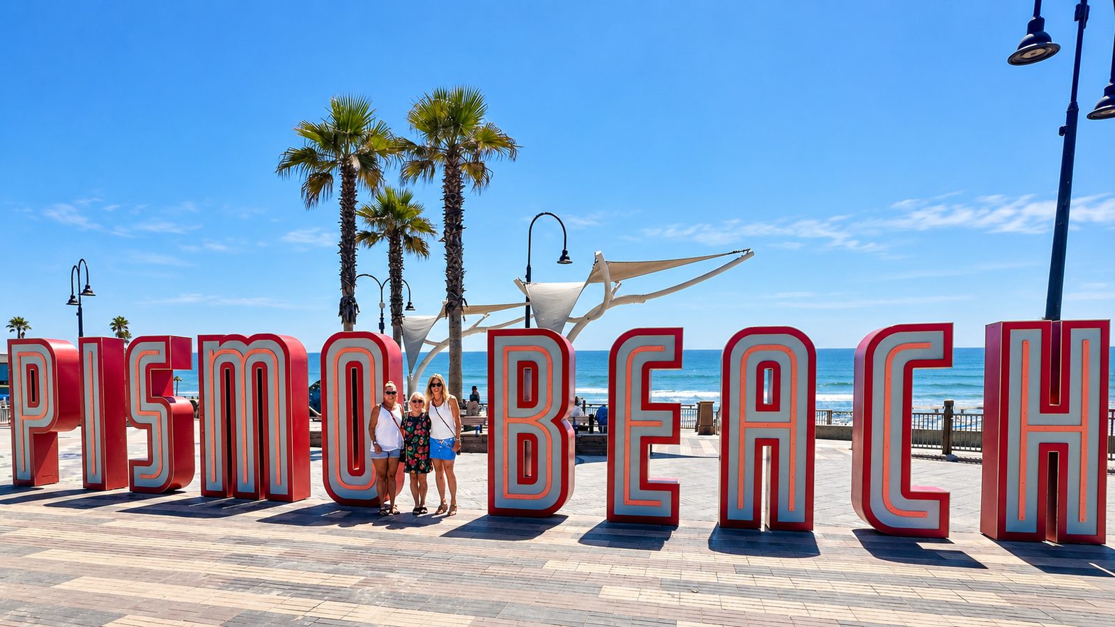 The Pismo Beach sign on the oceanfront boardwalk