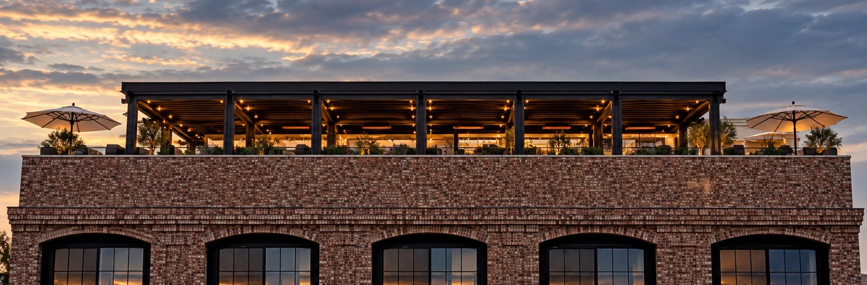 The rooftop lounge at Salina atop The Piccolo Hotel at sunset
