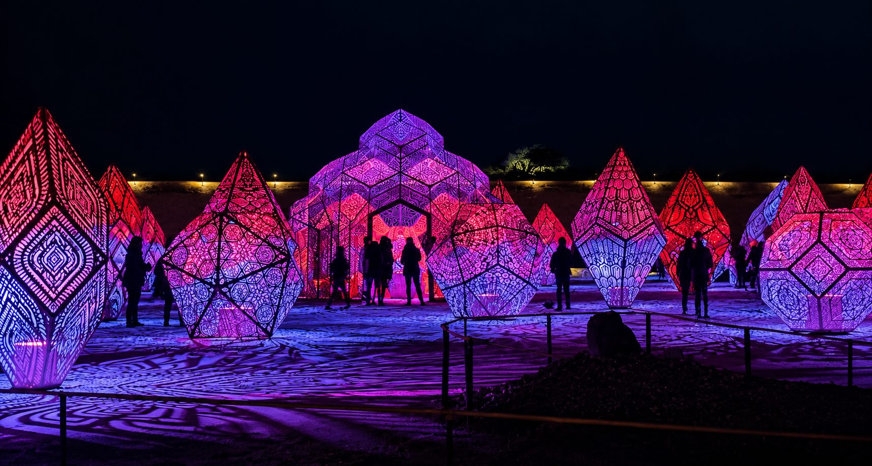 Glowing geometric lantern sculptures at Sensorio, Paso Robles, at night
